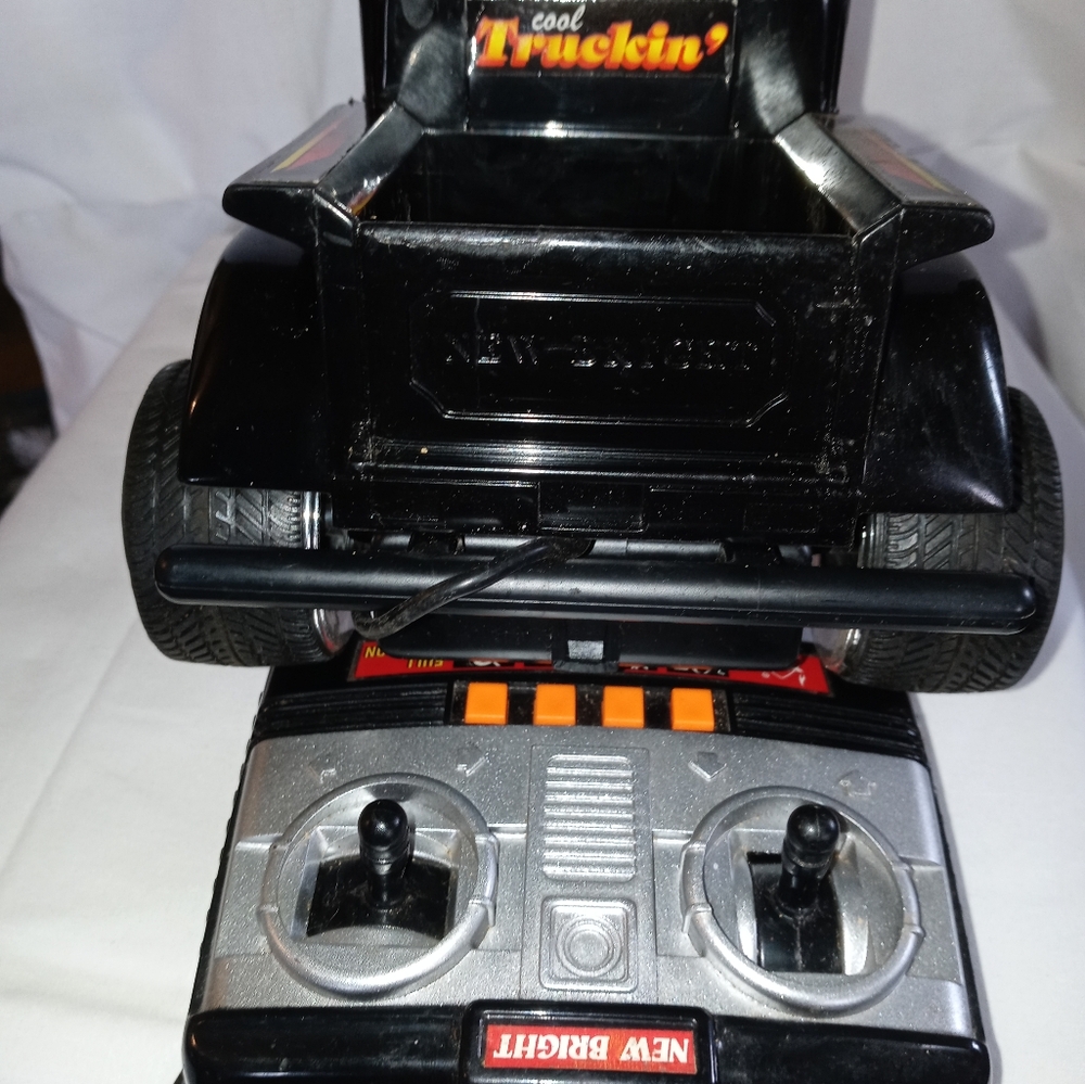 Vintage wired remote control hot rod toy By New Bright, multicolor. Works